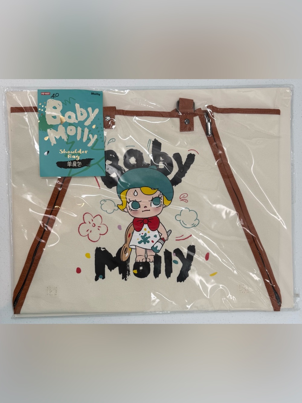 Baby Molly Cream Canvas Kids Shoulder Bag with Brown Trim and Playful Print